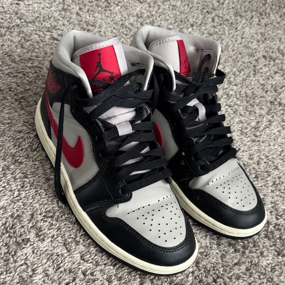 Nike womens Black and Red High-Top air Jordan’s